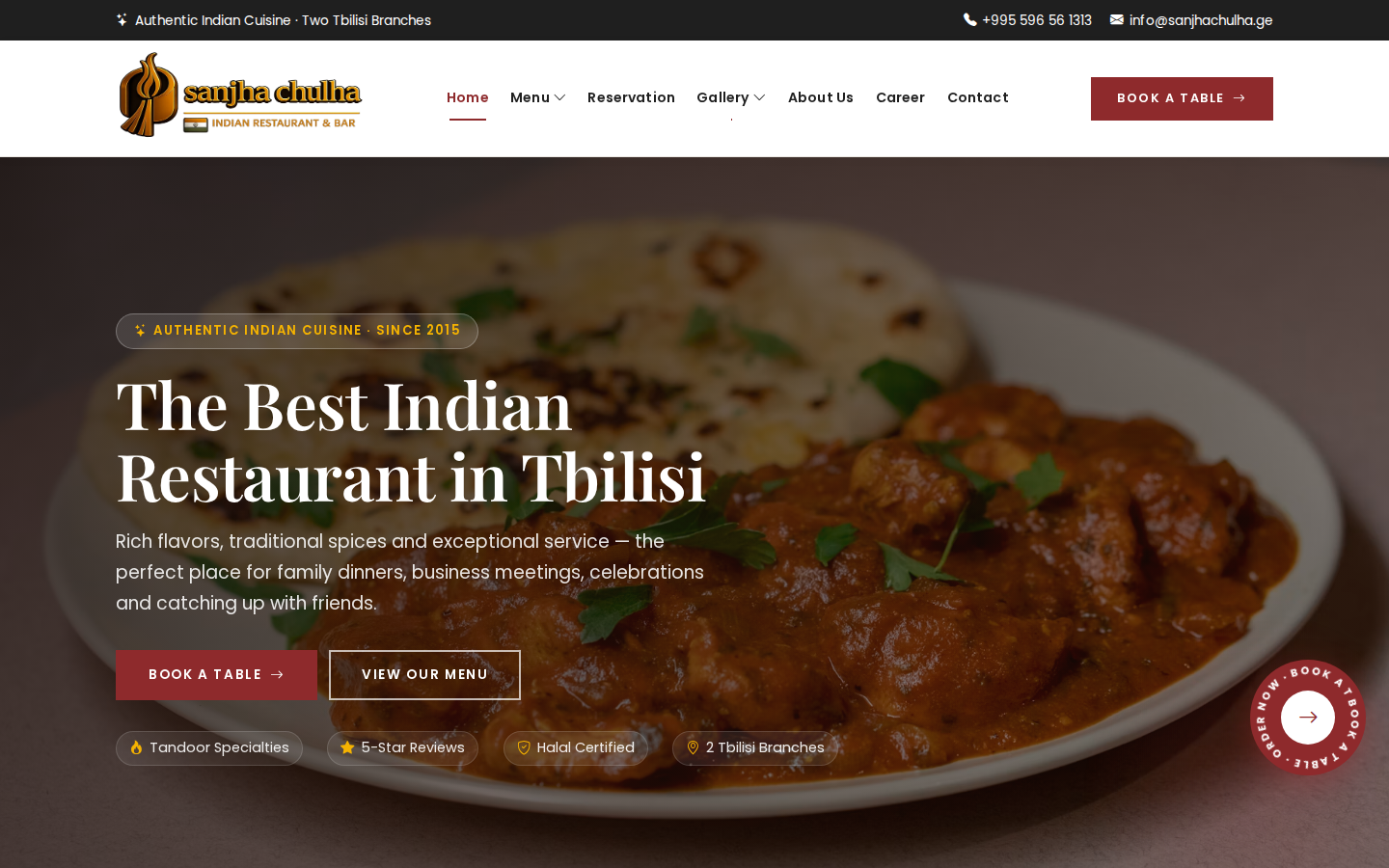 Sanjha Chulha homepage with hero photography and book a table call to action